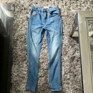 High Rise Light Wash Denim Jeans.